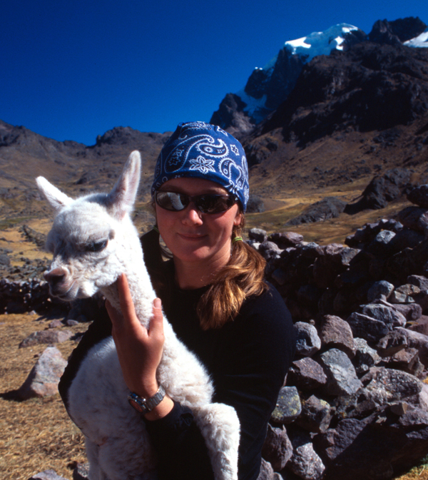 Jill makes friends with a baby Alpaca, Cordillera Carabaya, southern Peru.
