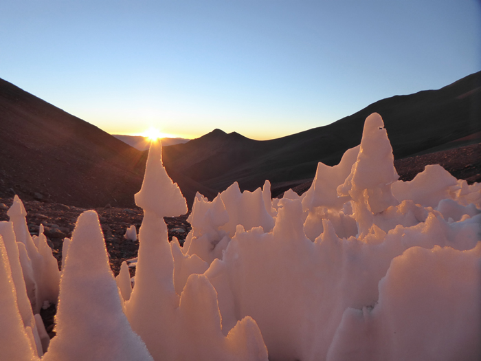 Penitente snow formations at sunrise on Colanguil.  