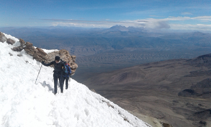 Traversing a penitente snowfield at 6000m on Nevado Chachani. 