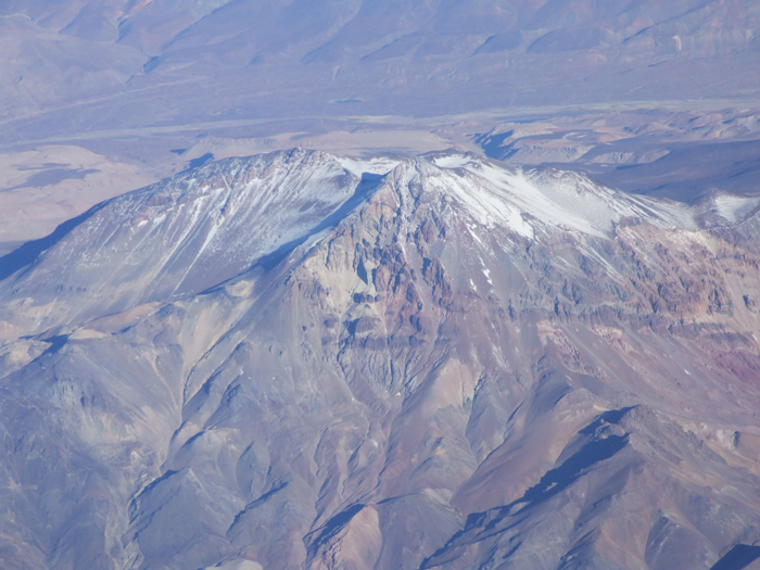 An aerial view of tortolas form the west. The normal routes to the summit are from this Chilean side of the peak. 